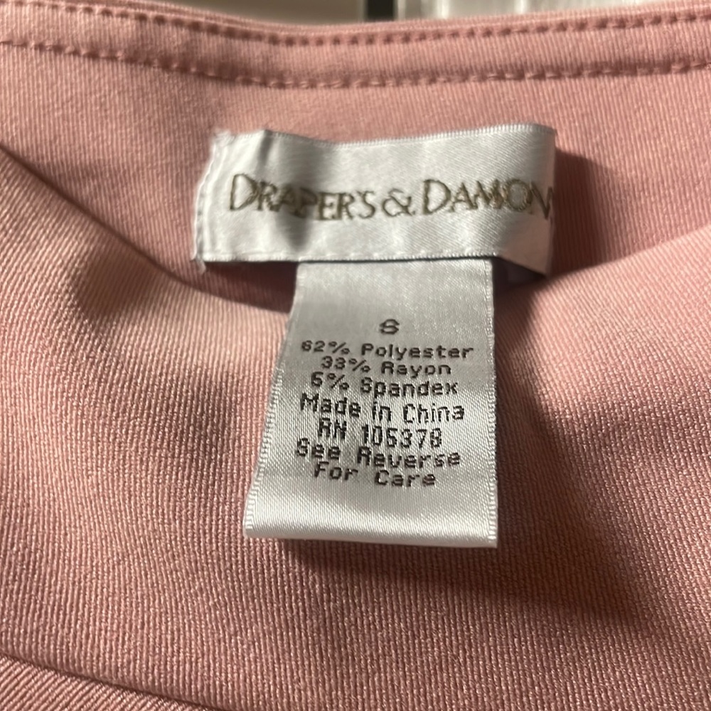 Storage wrinkled and never worn mostly polyester.